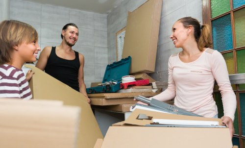 House movers working on a residential move in Brent with boxes and furniture