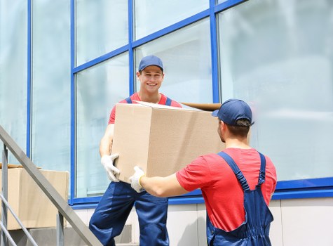 Removal van and movers ready for a house move in Brent