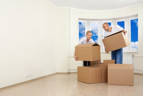Packing and loading items into a van for a Brent relocation