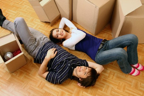Local removals team handling furniture in Brent